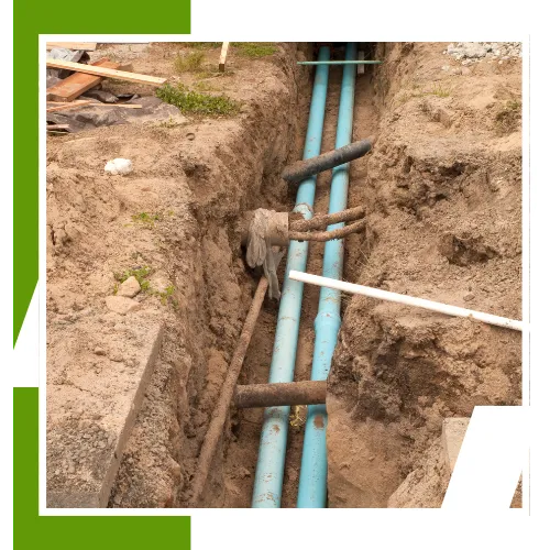Trenchless sewer line replacement work with less digging in a yard 
