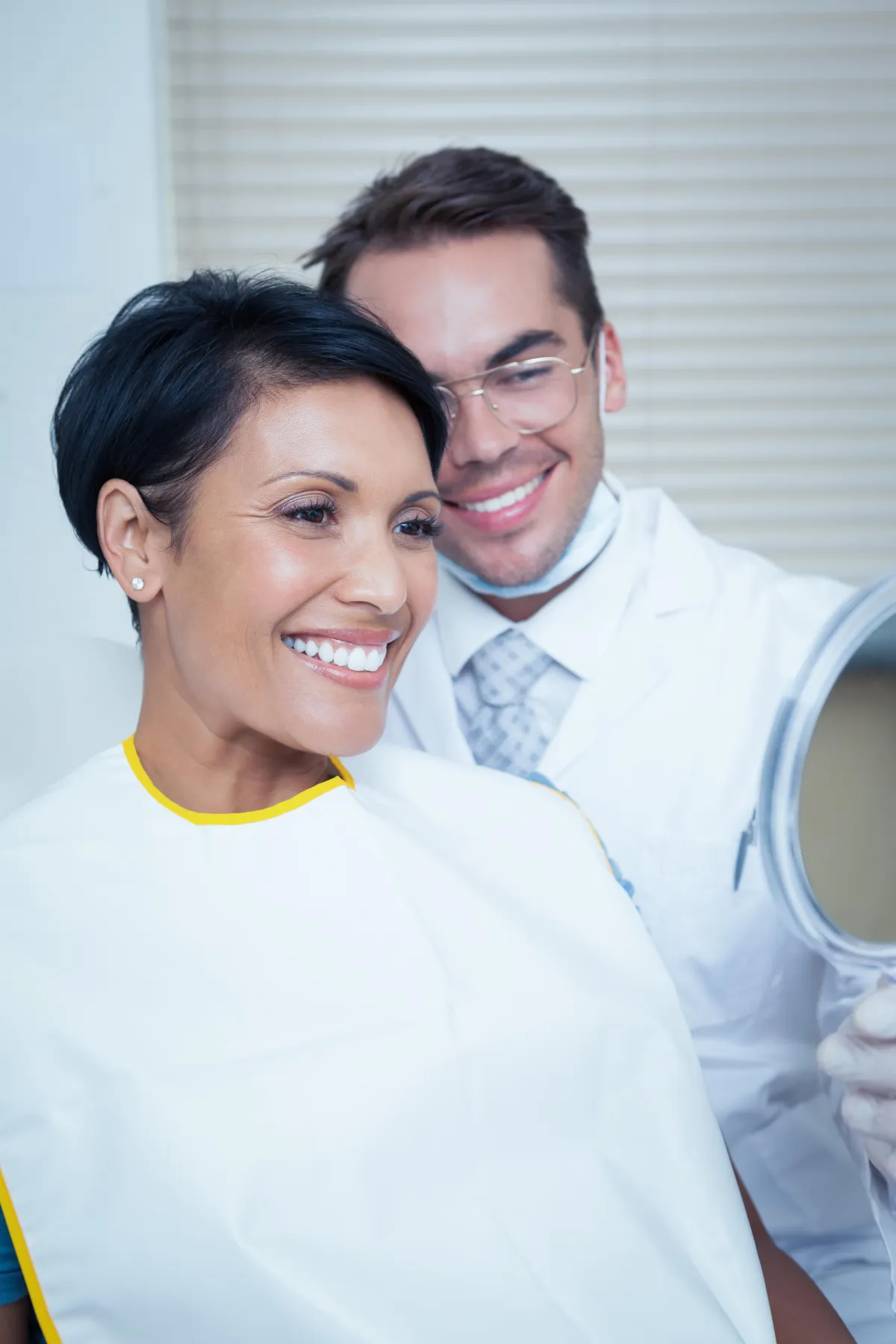 A dentist examining a patients teeth