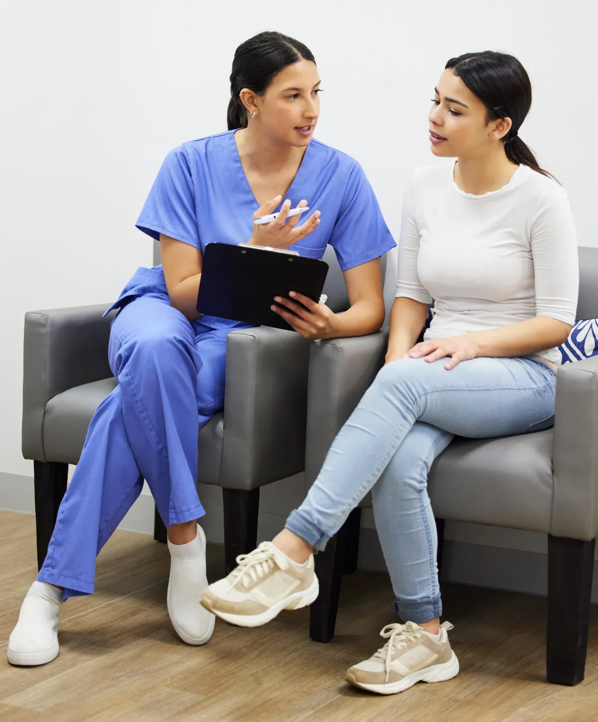 a dentist holding a dental tool over a person's mouth