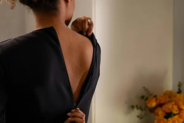 midlife woman experiencing bloating in perimenopause and menopause