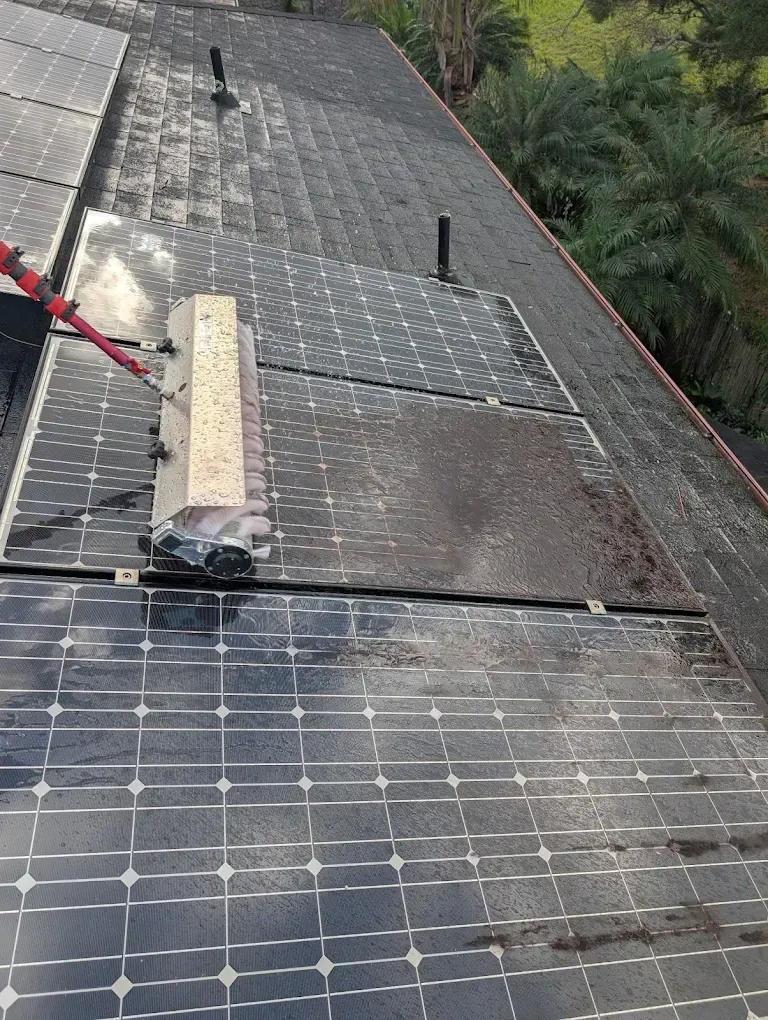 A house with a solar panel on the roof