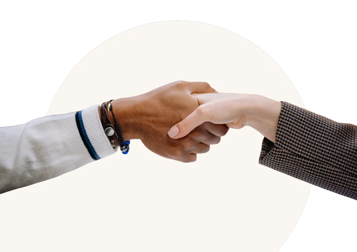 Close-up of a handshake between two people, representing a successful match between employer and CareerSeeke