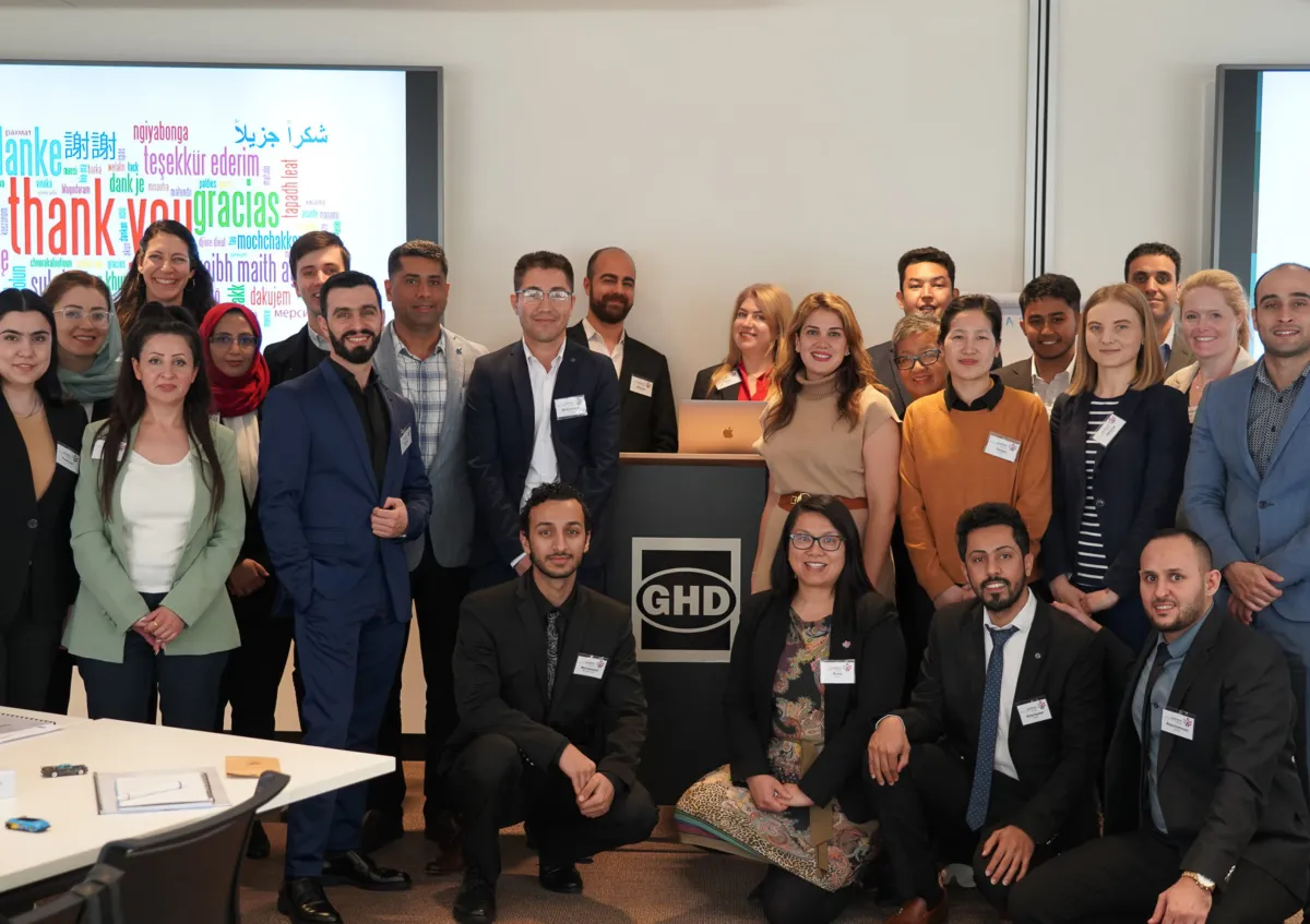 A large group of GHD team members, CareerSeekers' participants and team posing together at a CareerSeekers training day