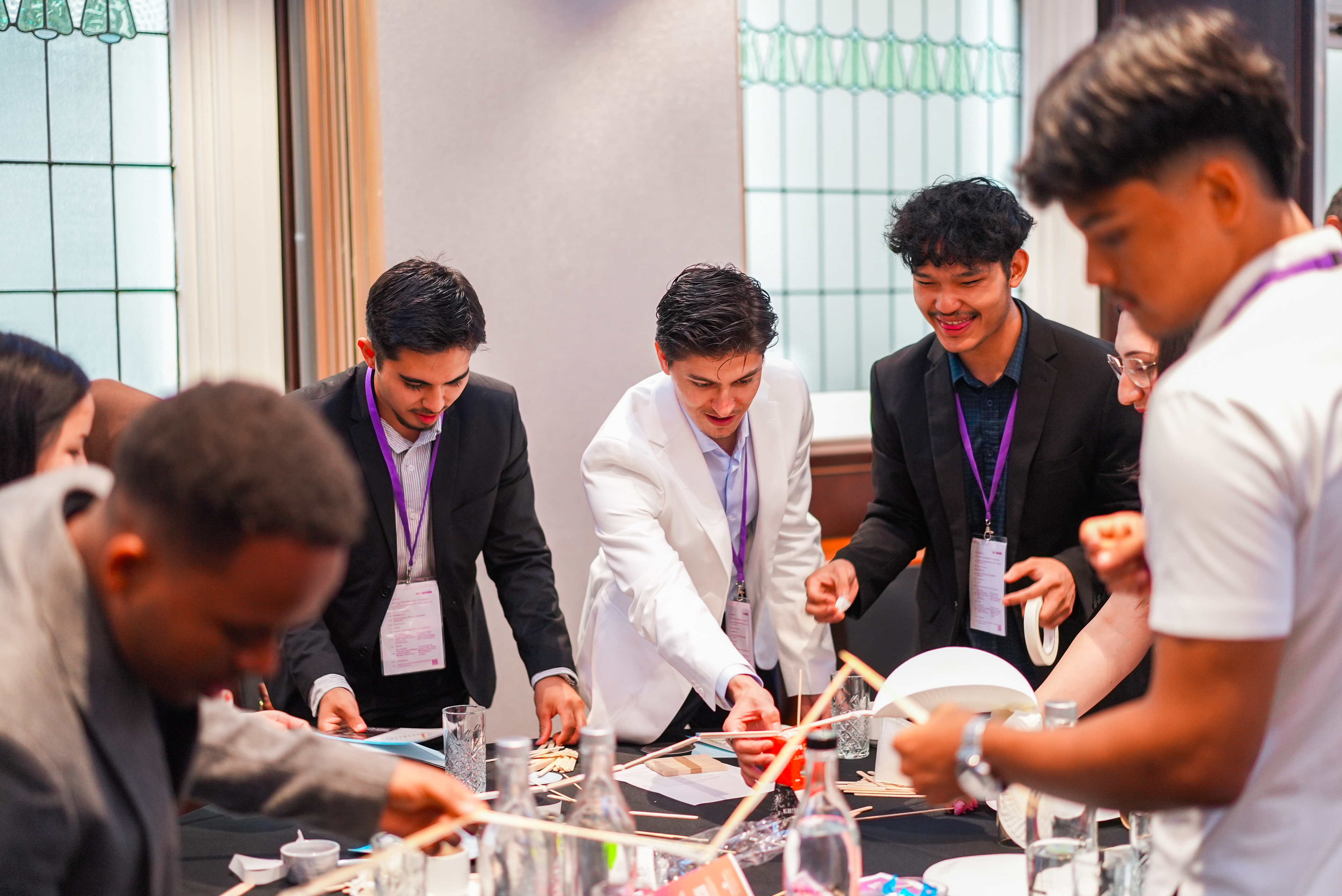 Small group of CareerSeekers' participants collaborating at a table during a workshop session