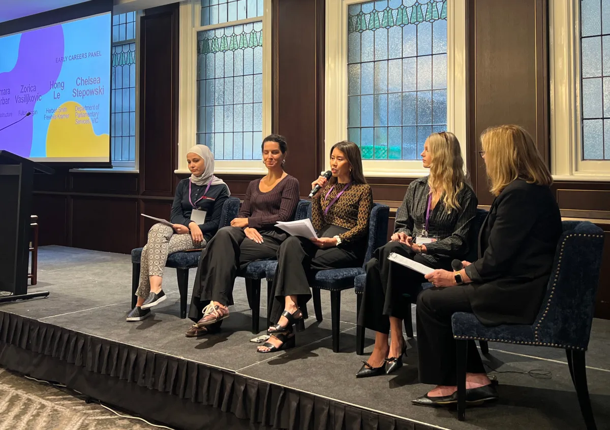 A panel of four women seated together on stage at a CareerSeekers Leadership Development Institute (LDI) event