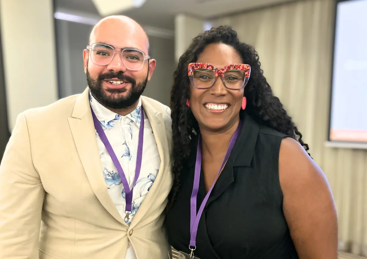 Two people at a CareerSeekers' Leadership Development Institute (LDI) event posing together