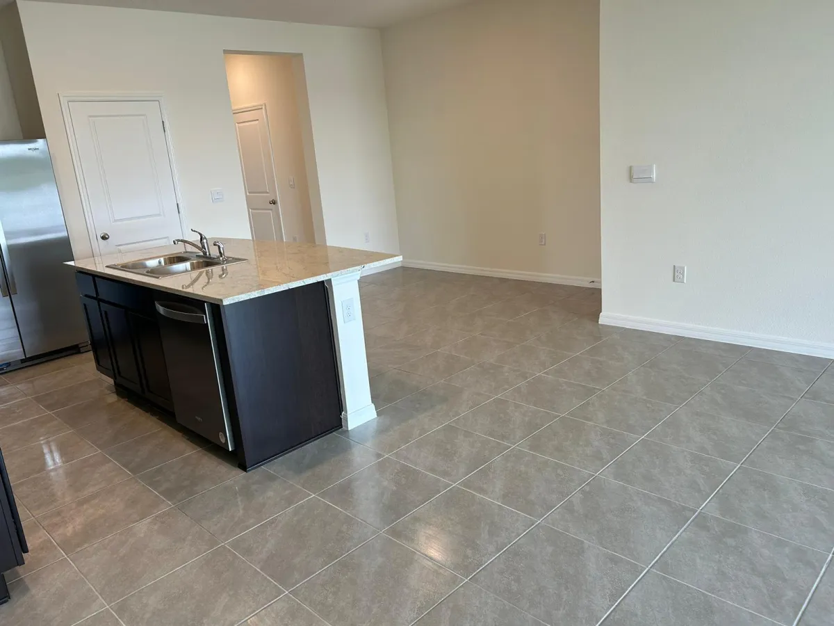 a couple of metal containers with metal objects on a table