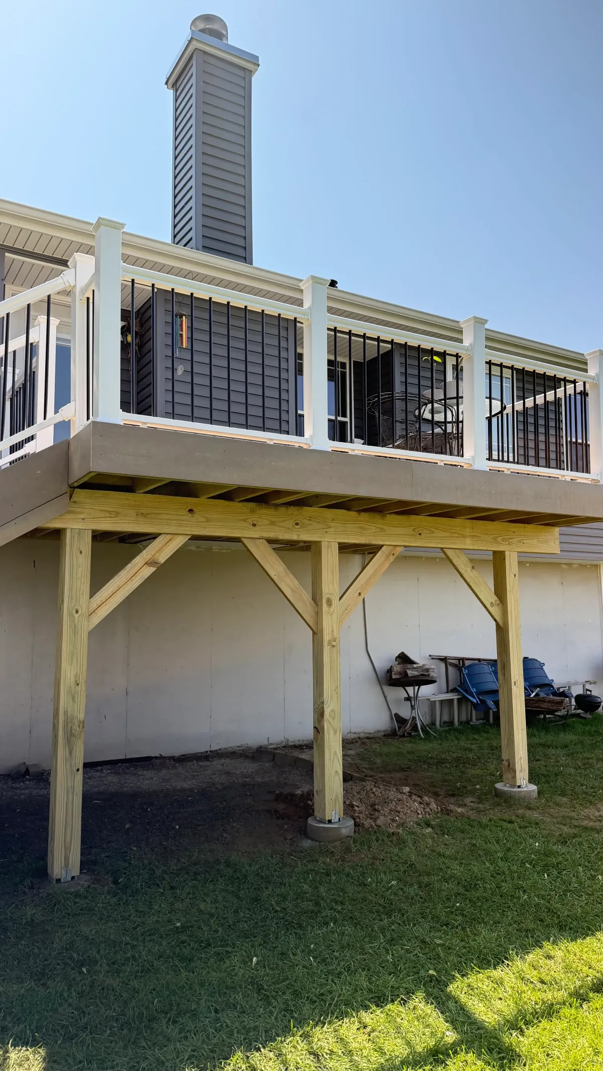 Renovated screened-in porch with wood frame in Dardenne Prairie, MO – cozy outdoor living upgrade.