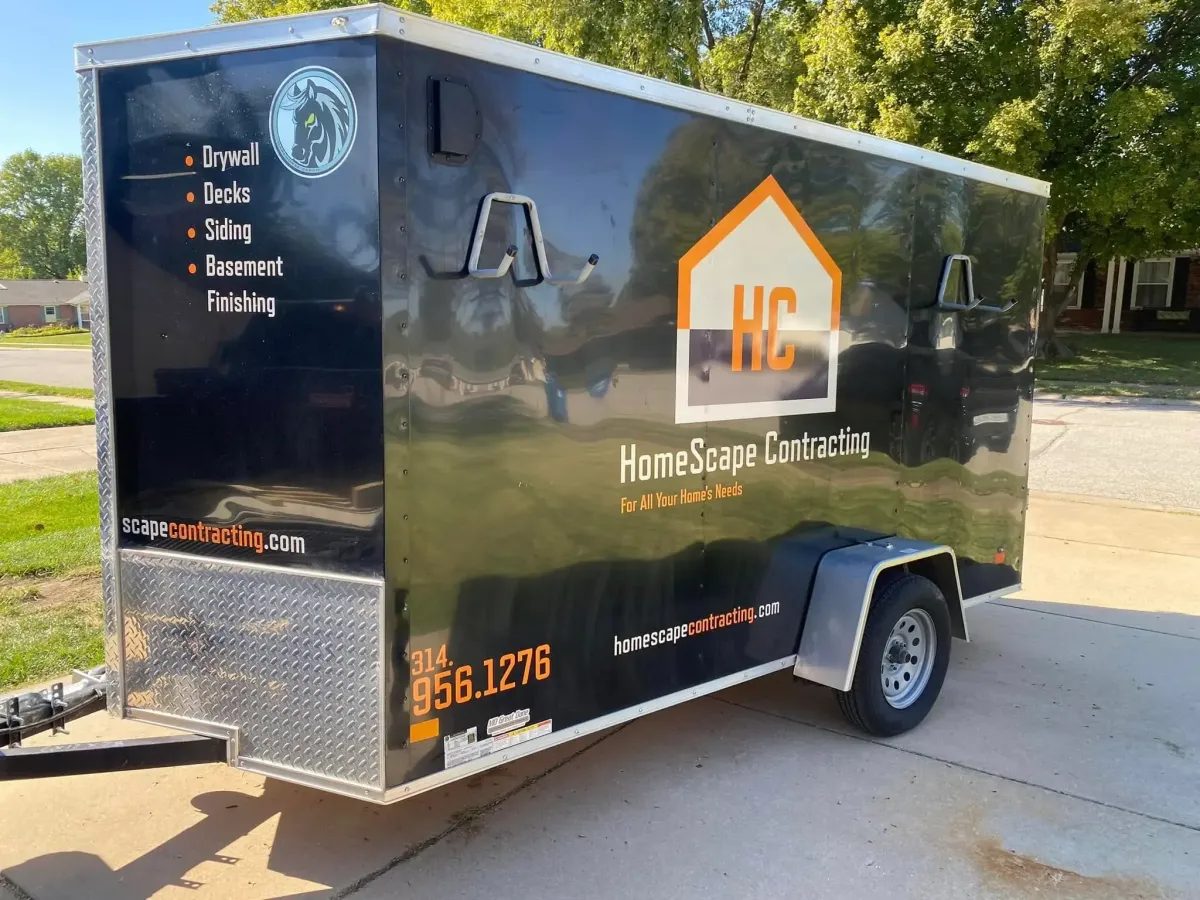 HomeScape Contracting branded contractor truck in St. Charles, MO with contact details and logo.