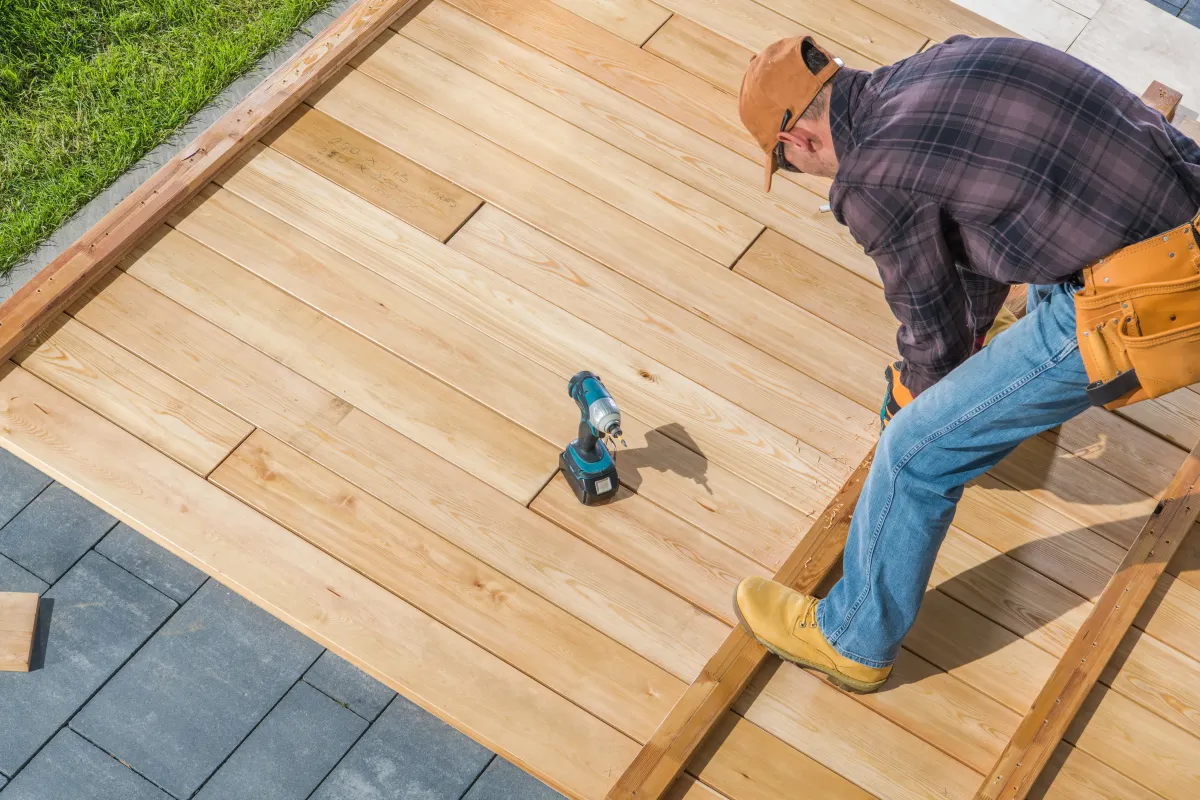 Timber installation in progress for backyard deck construction in O’Fallon, MO – professional deck build.