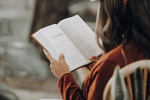 Woman reading Proverbs