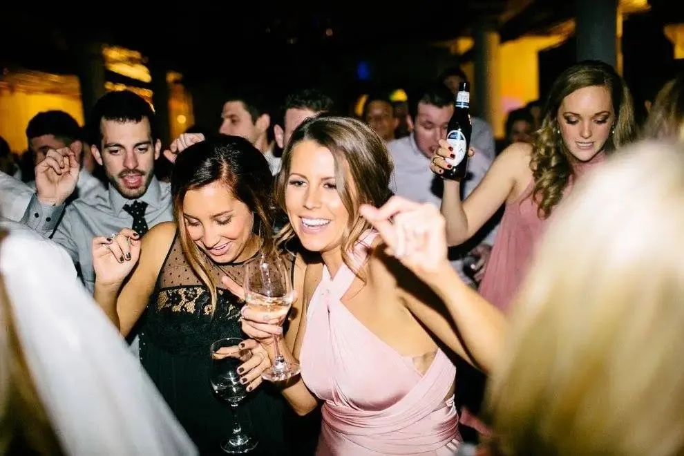 Springfield, MO wedding DJ keeping dance floor full with guests dancing and celebrating
