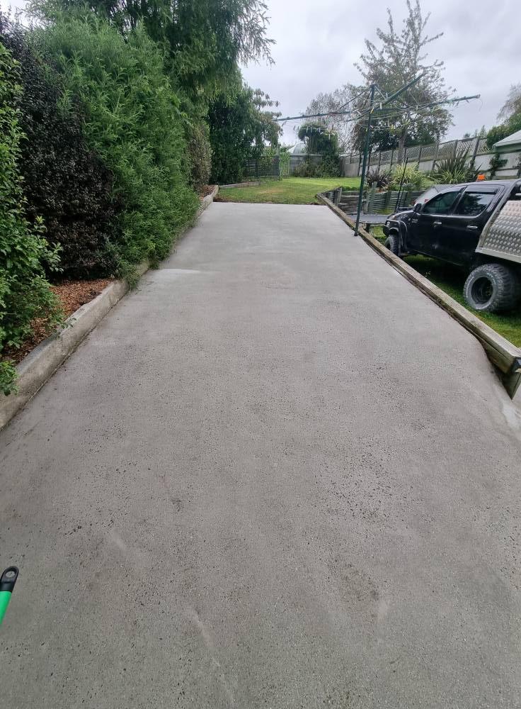 Clean driveway after pressure washing in Dunedin