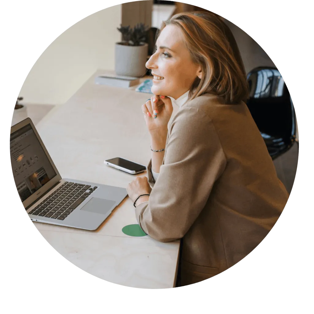 A woman updating her Minutes on computer
