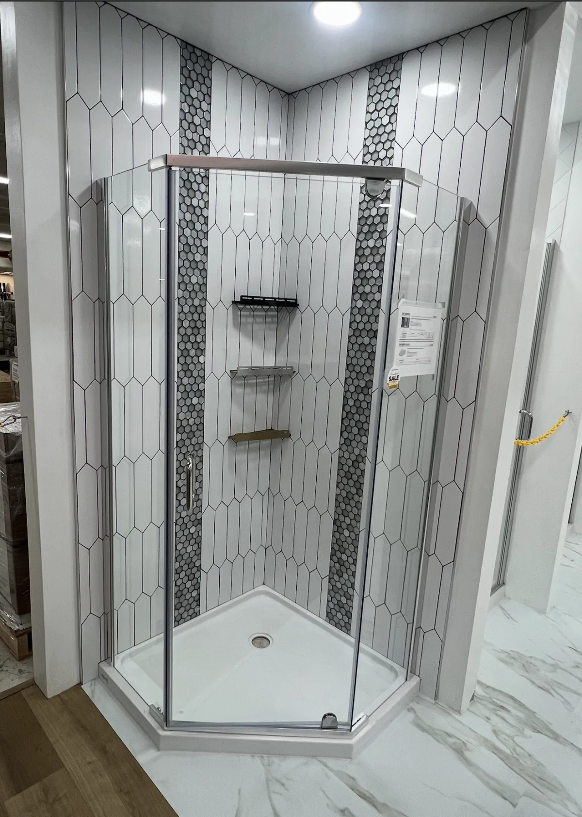 A large mirror reflecting a building's windows