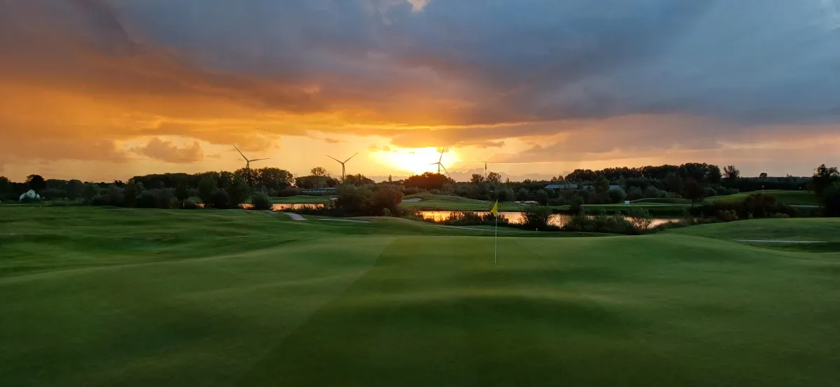 golf course under sunny sky