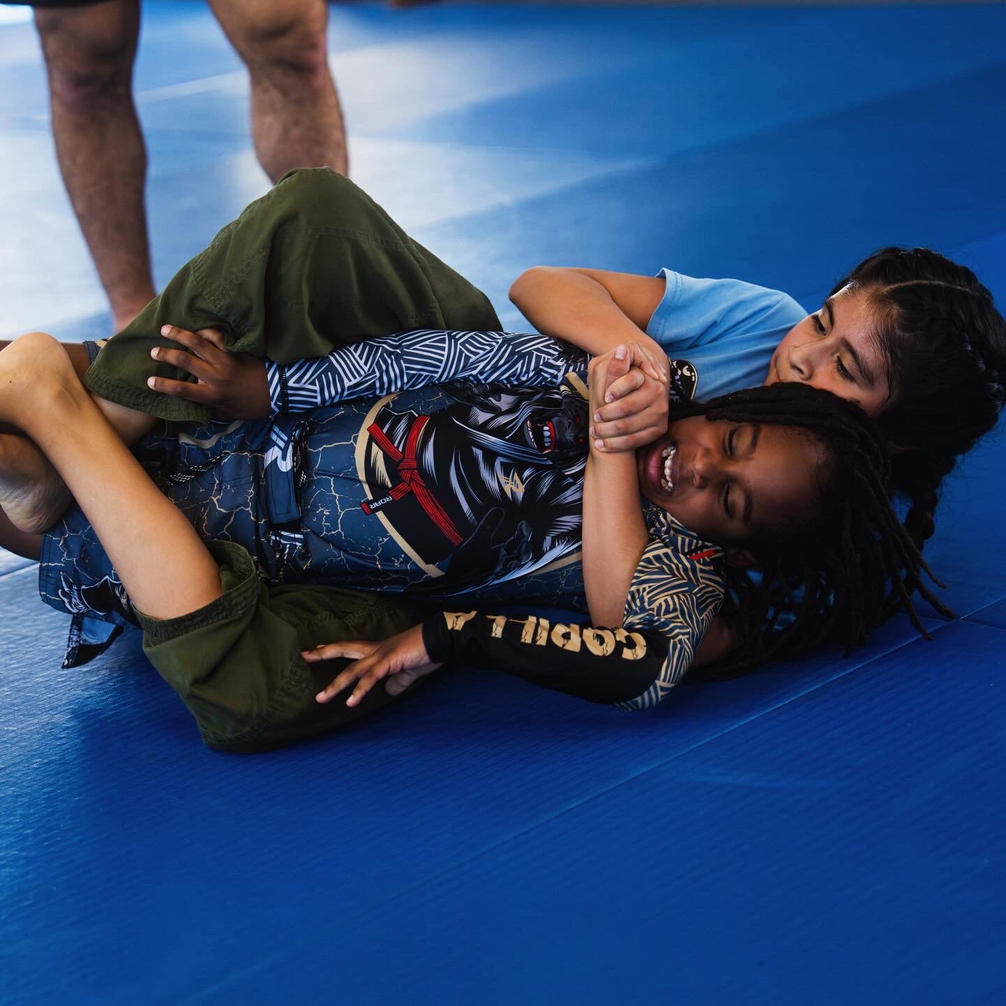 Kids practicing nogi jiujitsu