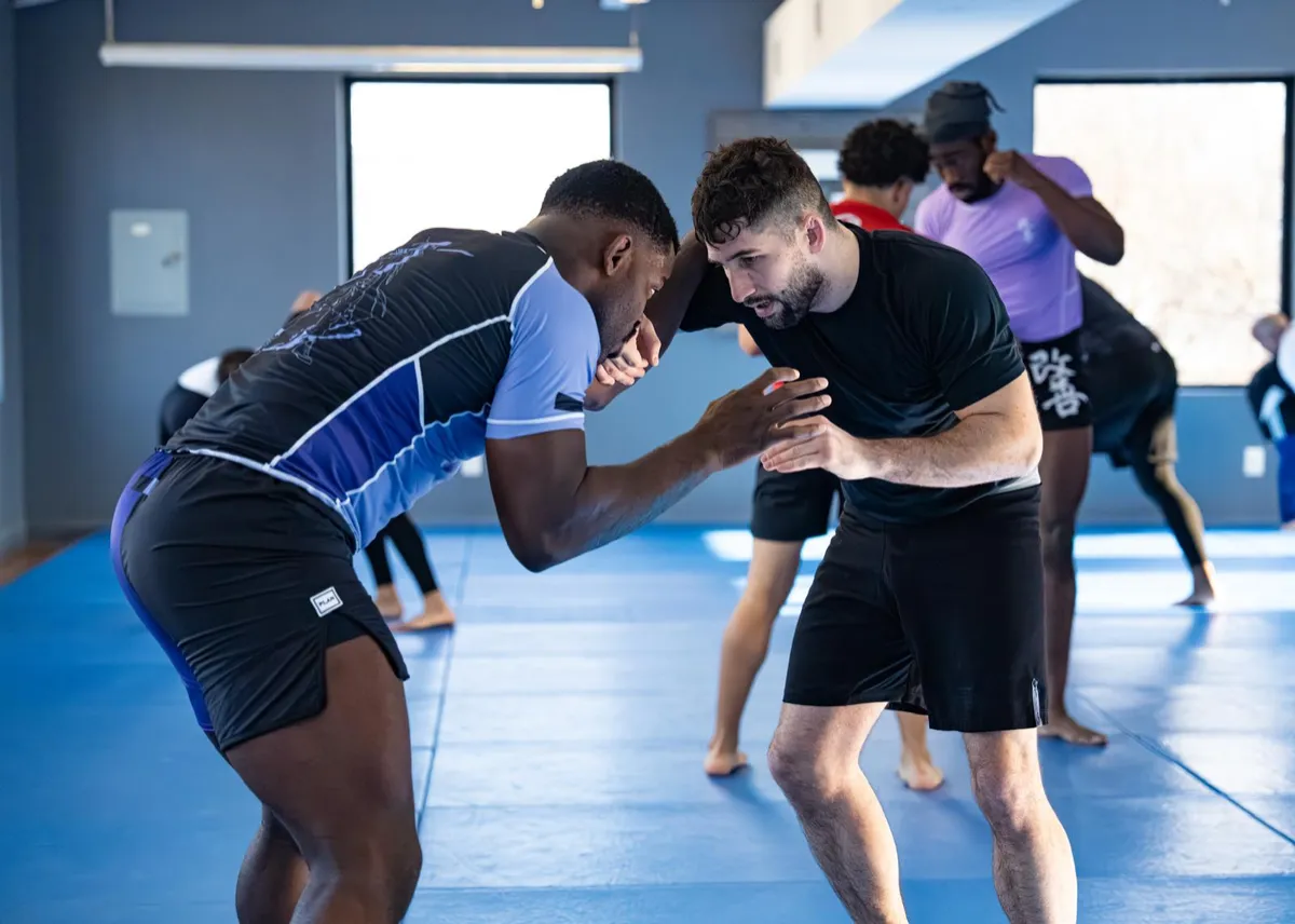 two adults training