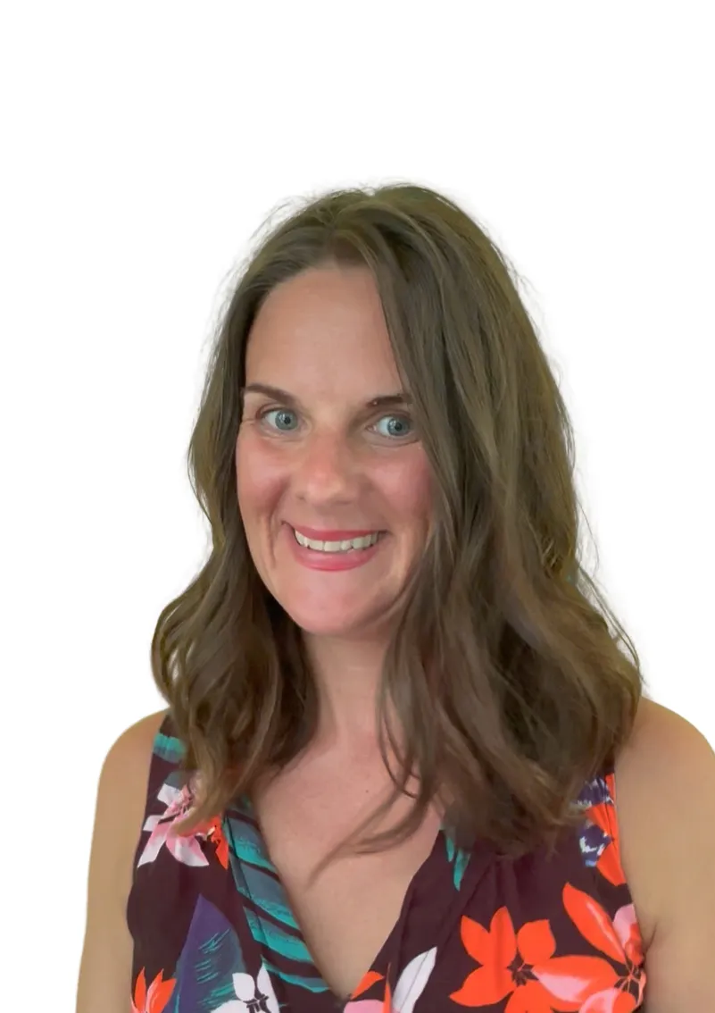 Kelee Love smiling in a floral dress, spiritual life coach and retreat leader based in Costa Rica