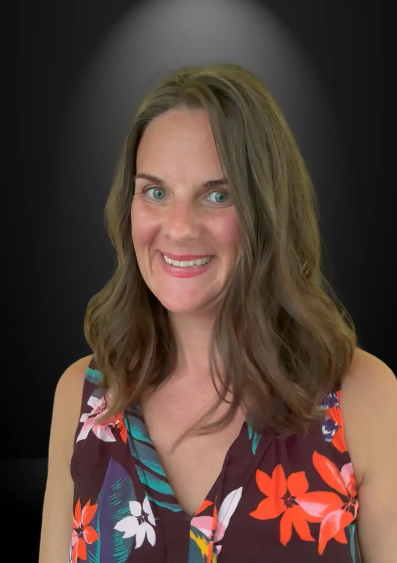 Kelee Love smiling in a floral dress, spiritual life coach and retreat leader based in Costa Rica