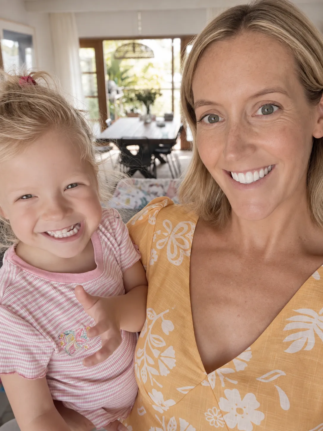 Elly with her toddler daughter at home