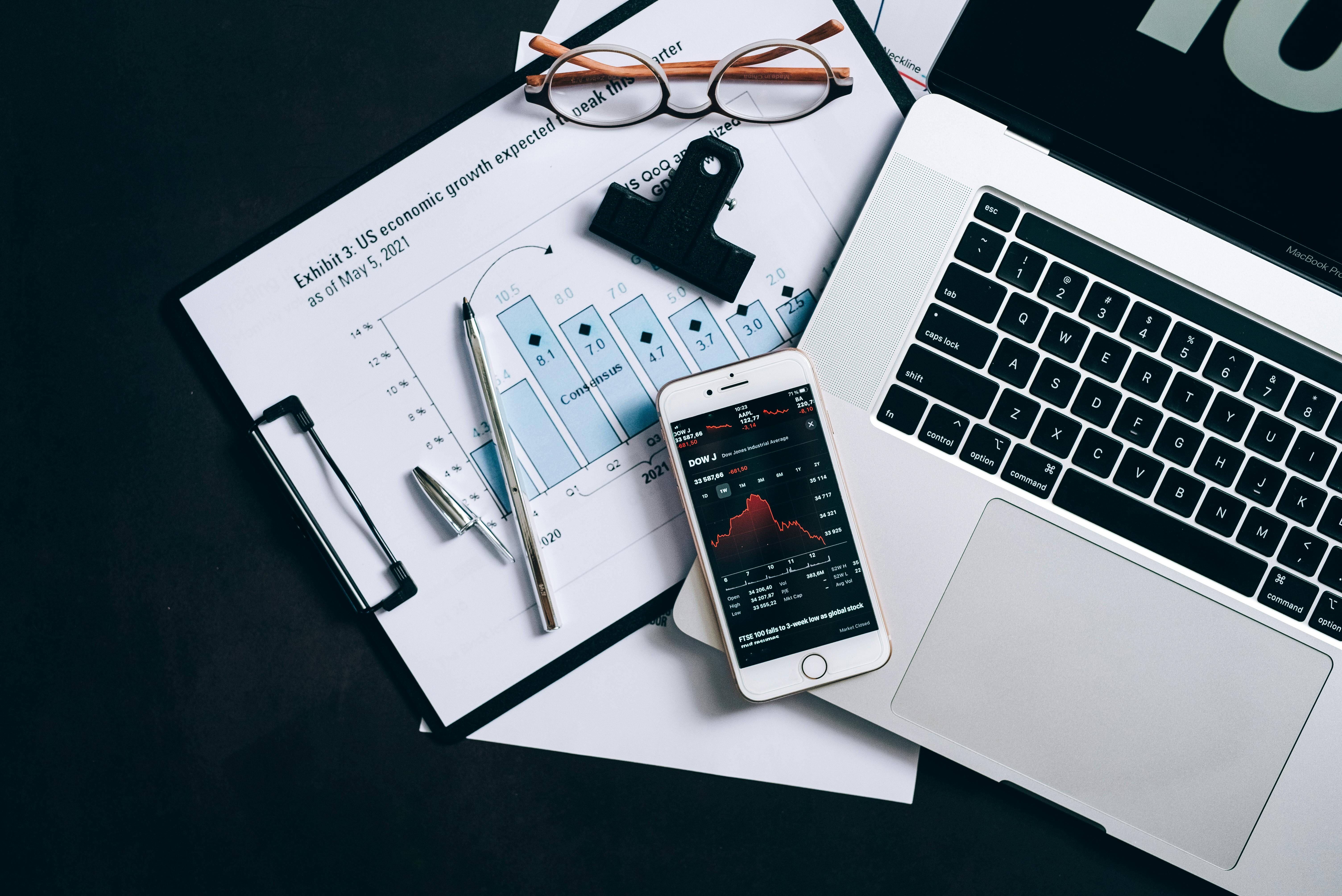 two people drawing on whiteboard