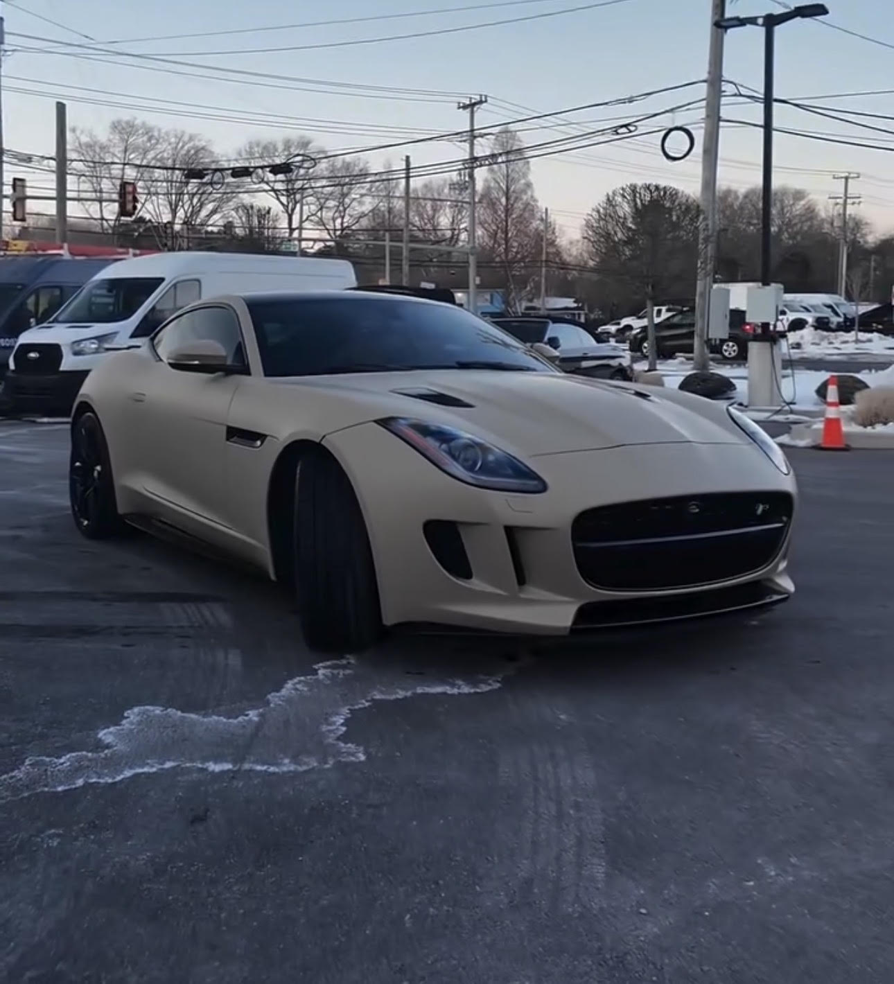 Jaguar in a tan wrap applied by Car Toyz in Egg Harbor Township, New Jersey