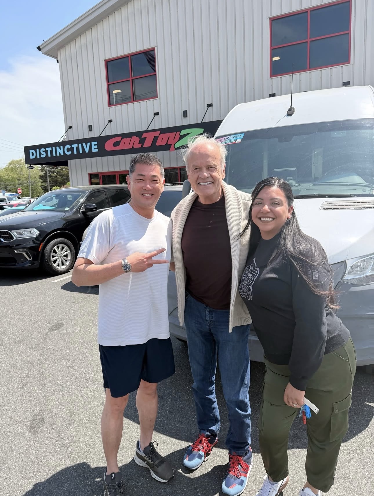 Distinctive Car Toyz Owner James Lin with American actor Kelsey Grammer and BDC/Sales Associate Stacy Bustamante.