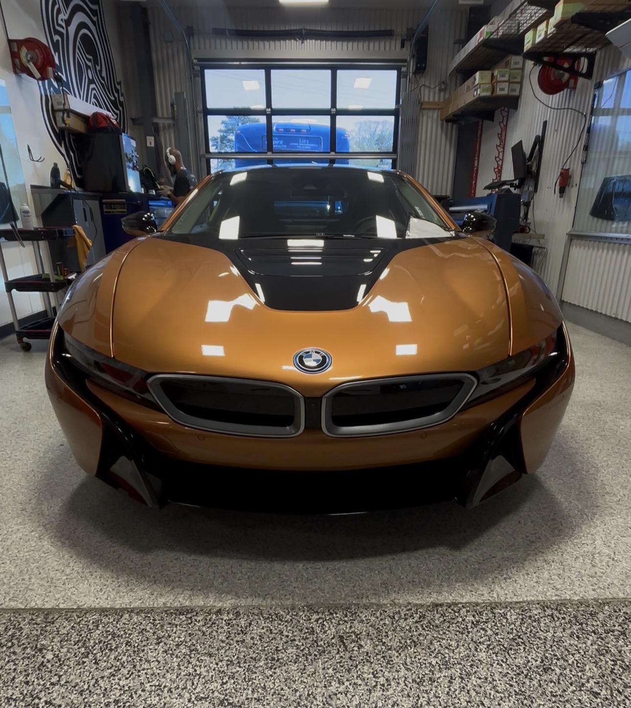 Head on shot of a BMW i8 in the window bay of Distinctive Car Toyz in Egg Harbor Township, New Jersey