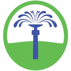 a logo of a green circle with a blue irrigation hose shape in the middle with blue water coming out of it