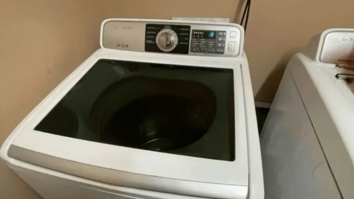 Top-load washing machine transmission repair completed in Lamont, CA near the Lamont Public Library.