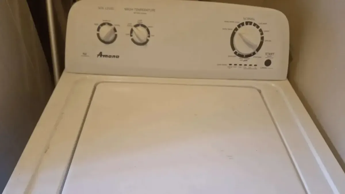 Top-load washing machine transmission repair completed in Lamont, CA near the Wasco Public Library.