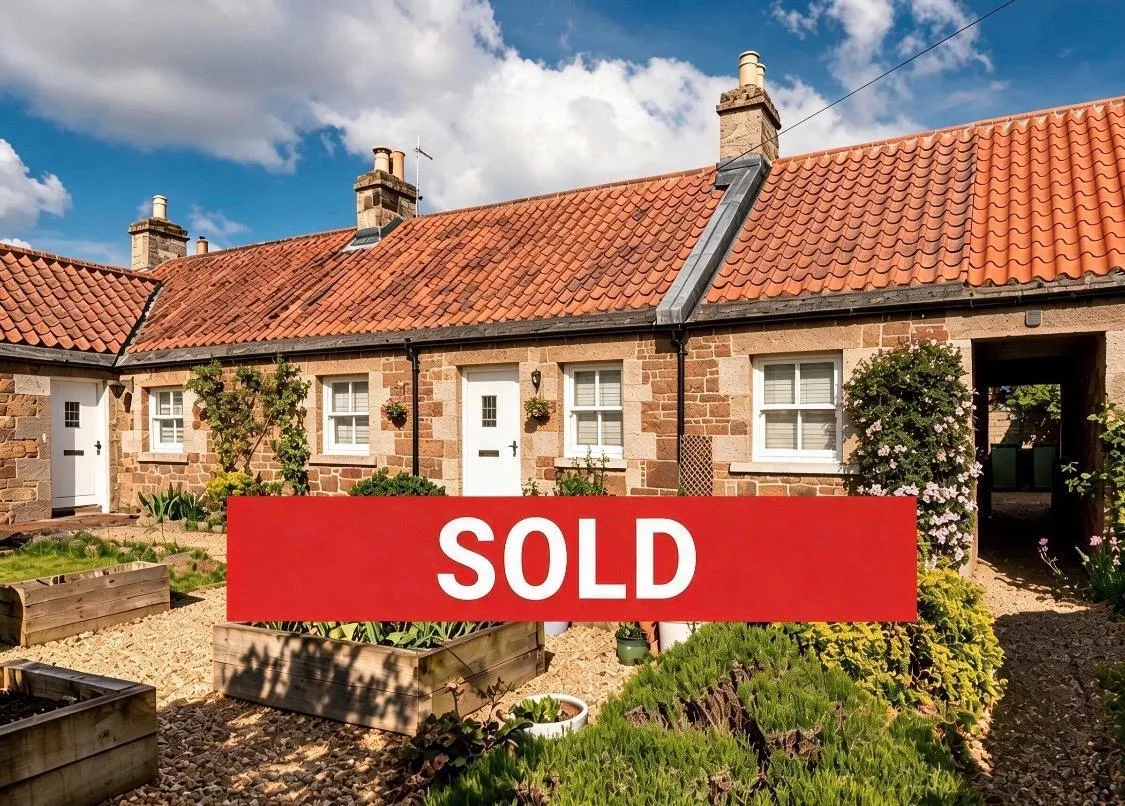 Red Pantiled cottage with pretty garden with SOLD banner across it