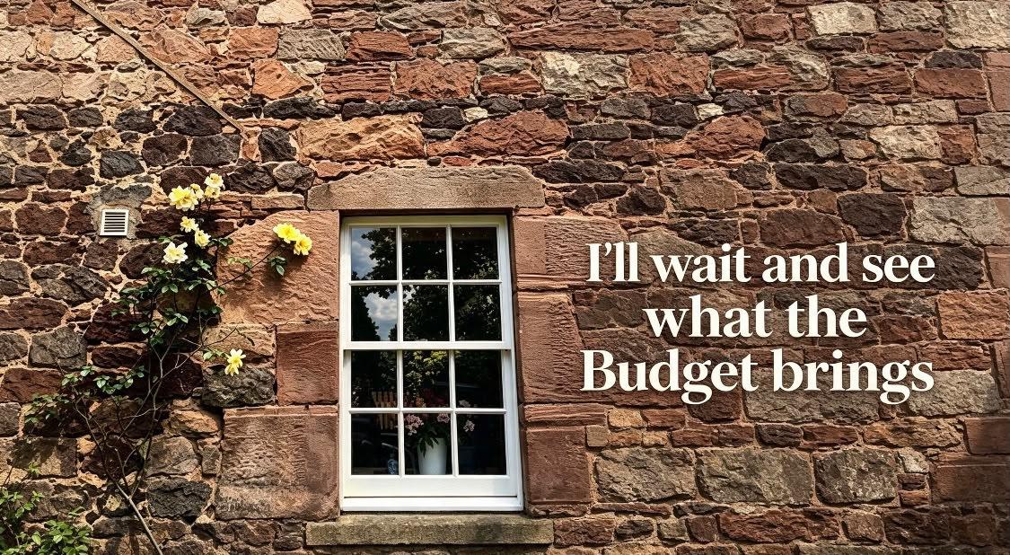Sandstone House, with window and climbing rose. Overlay caption 'I'll wait and see what the Budget brings'