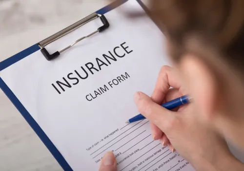 A room that has a lot of glass on the floor