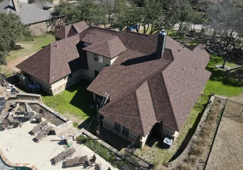 black rectangular device on brown roof