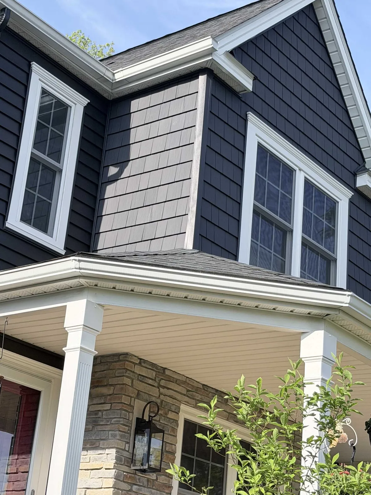 A charming, stylized cottage with a steep roof.