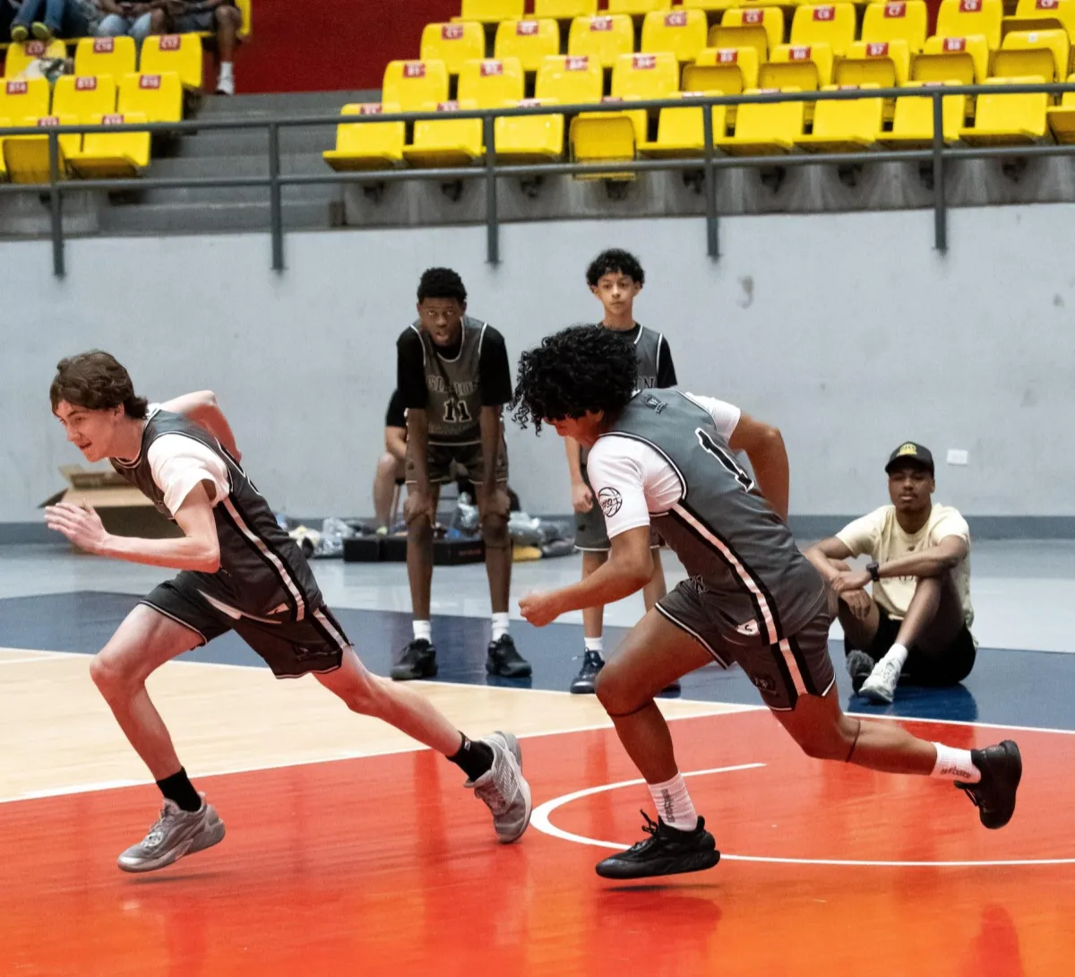 a person shooting a basketball