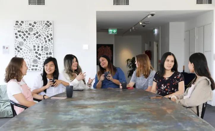 Diverse group of professionals in a workplace meeting