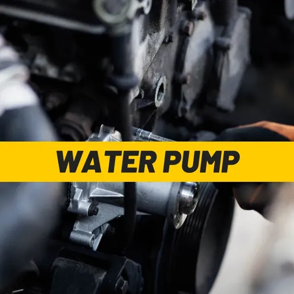 Car engine bay during a water pump job, a common cause of a coolant warning light, by a mobile mechanic in Kent