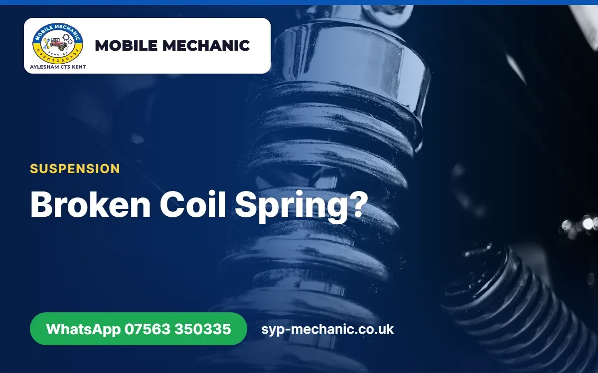 Front suspension coil spring on a raised car, inspected by a mobile mechanic in Kent