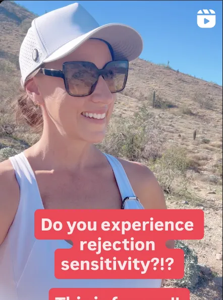 Melissa Dlugolecki, business coach and consultant, standing in a professional setting.