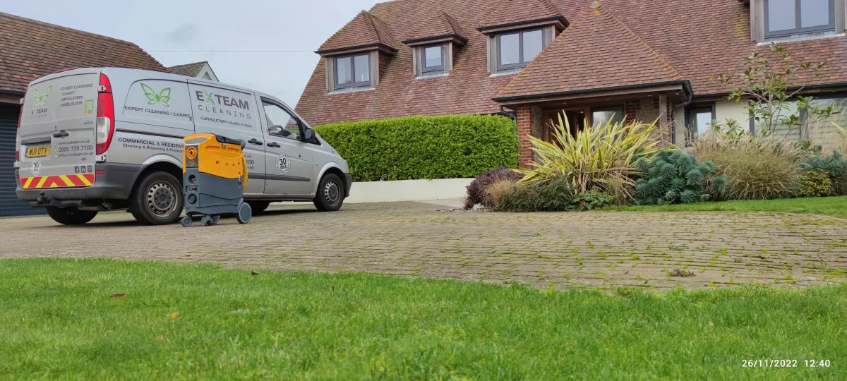 Branded eXteam Cleaning van arriving at a customer