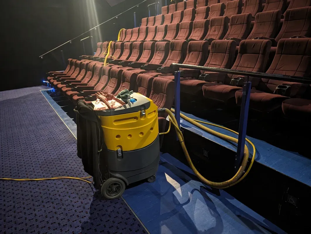 Professional cleaning of upholstered hall seating using specialist equipment