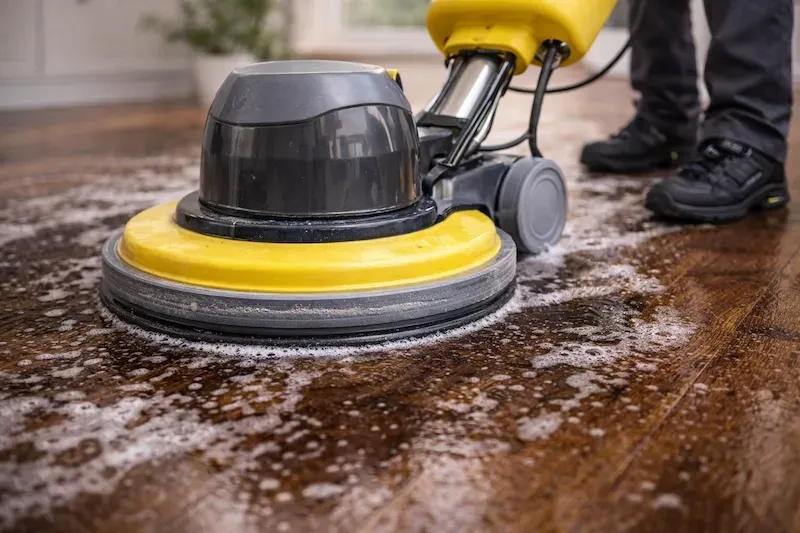 Close-up of professional hard floor tool removing residue build-up safely.
