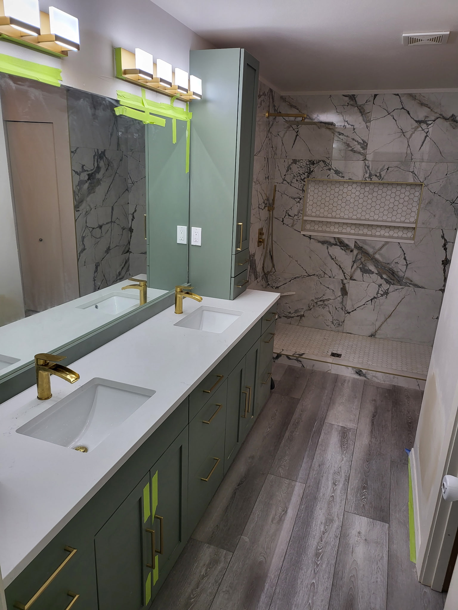 Cozy living room with fireplace and bookshelves.