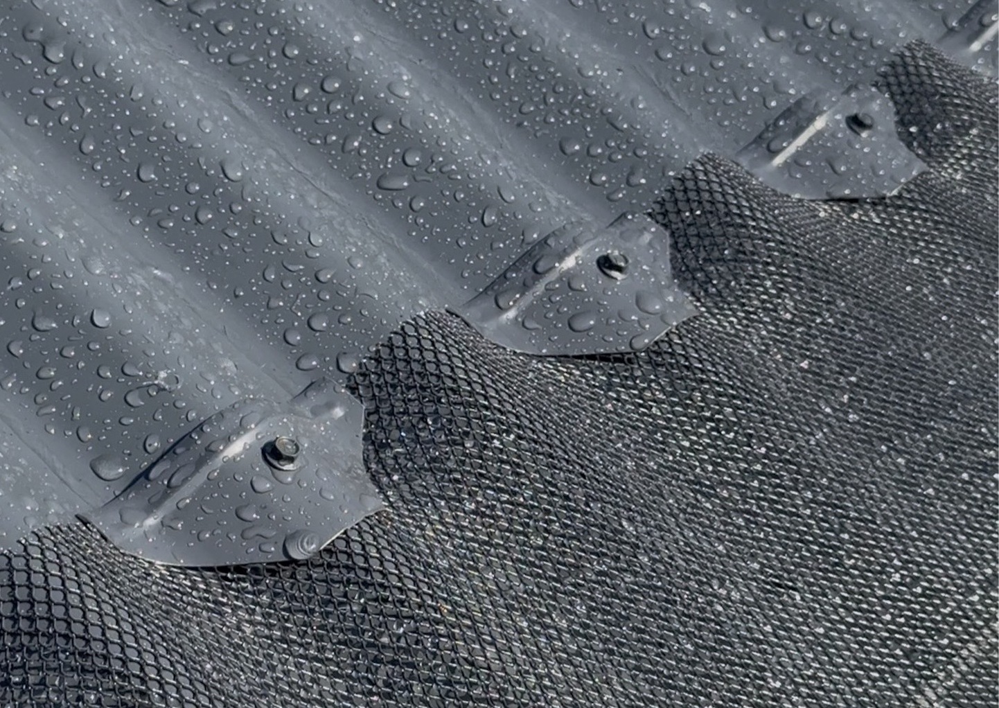 Close up corrugated gutter guard