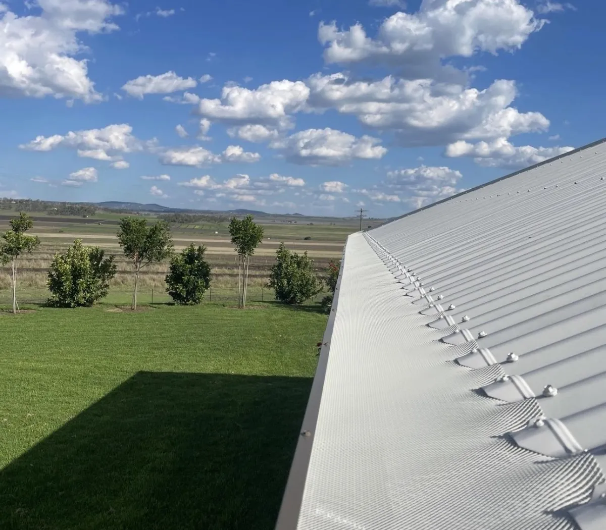 Corrugated iron gutter guard installed on farm