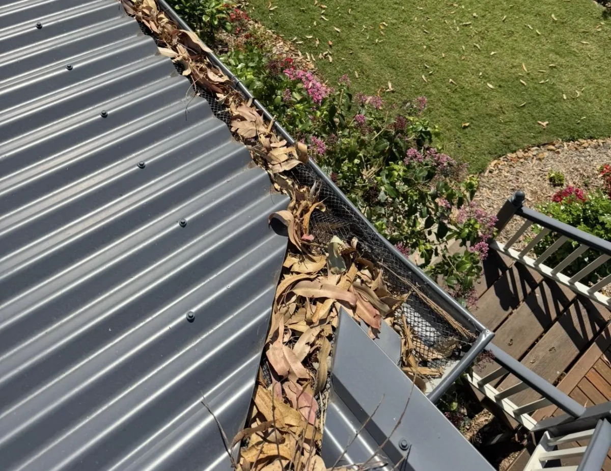 Plastic gutter guard mesh on valley