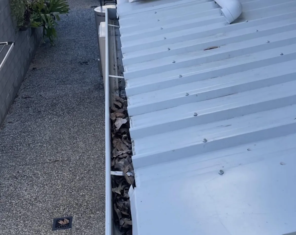 gutter with no gutter guards installed on it